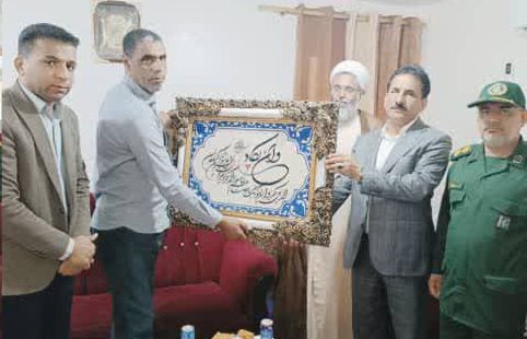 گرامیداشت هفته دفاع مقدس با تجلیل از فرماندار و جانباز سرافراز در قشم